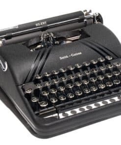Vintage Smith-Corona manual typewriter with round keycaps on a black body, shown from the side.