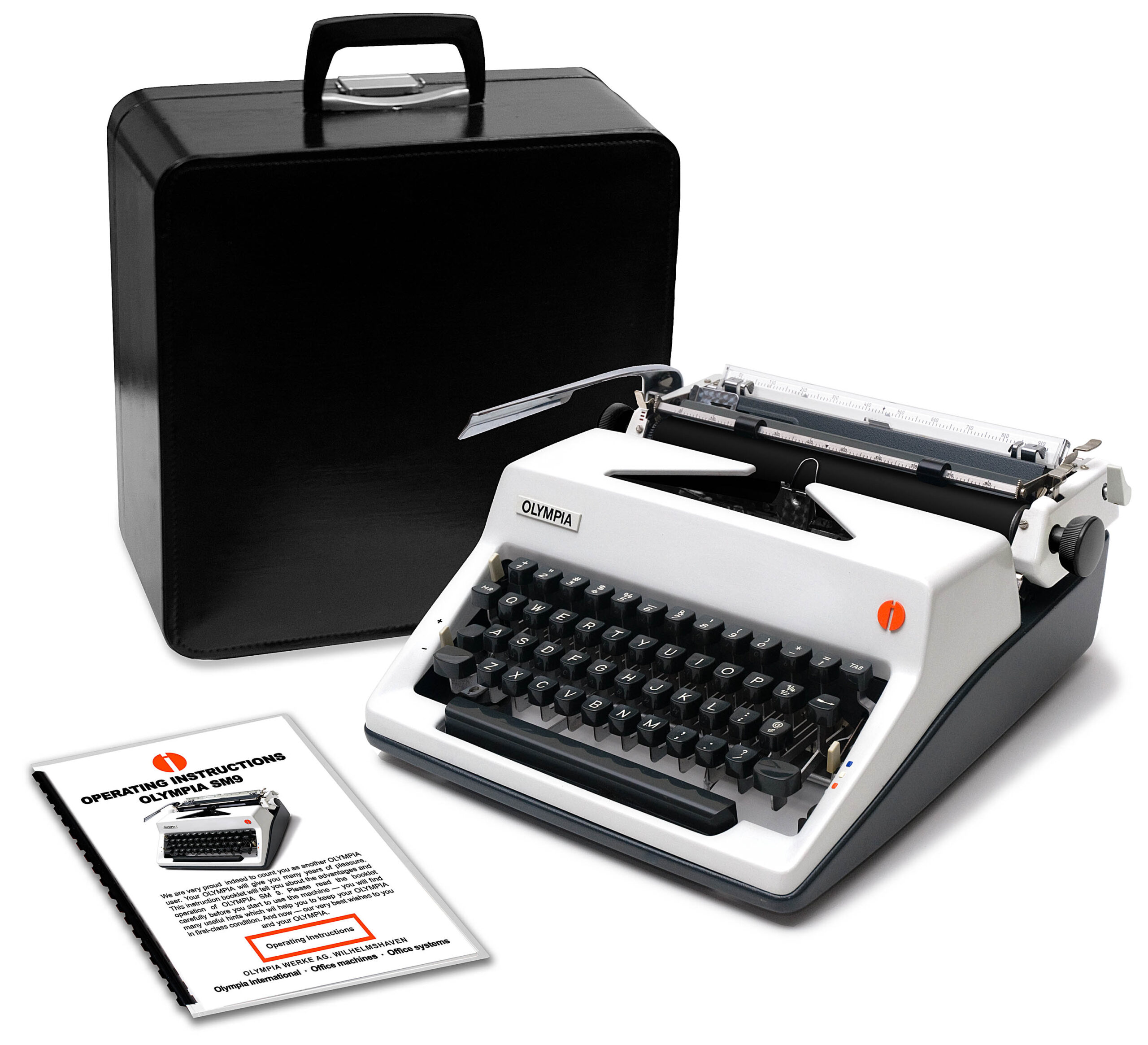 Orange and black Olympia typewriter with its black case and user manuals nearby, on a white background
