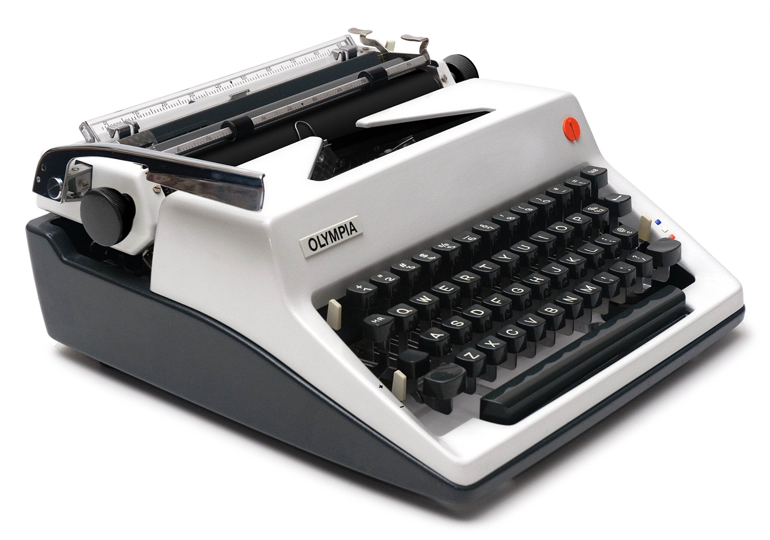Close-up of a vintage Olympia typewriter showing keys and metal carriage, gray body with black keys.