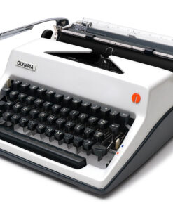 Olympia typewriter with a white body, black keys, and a visible carriage, photographed from a low angle.