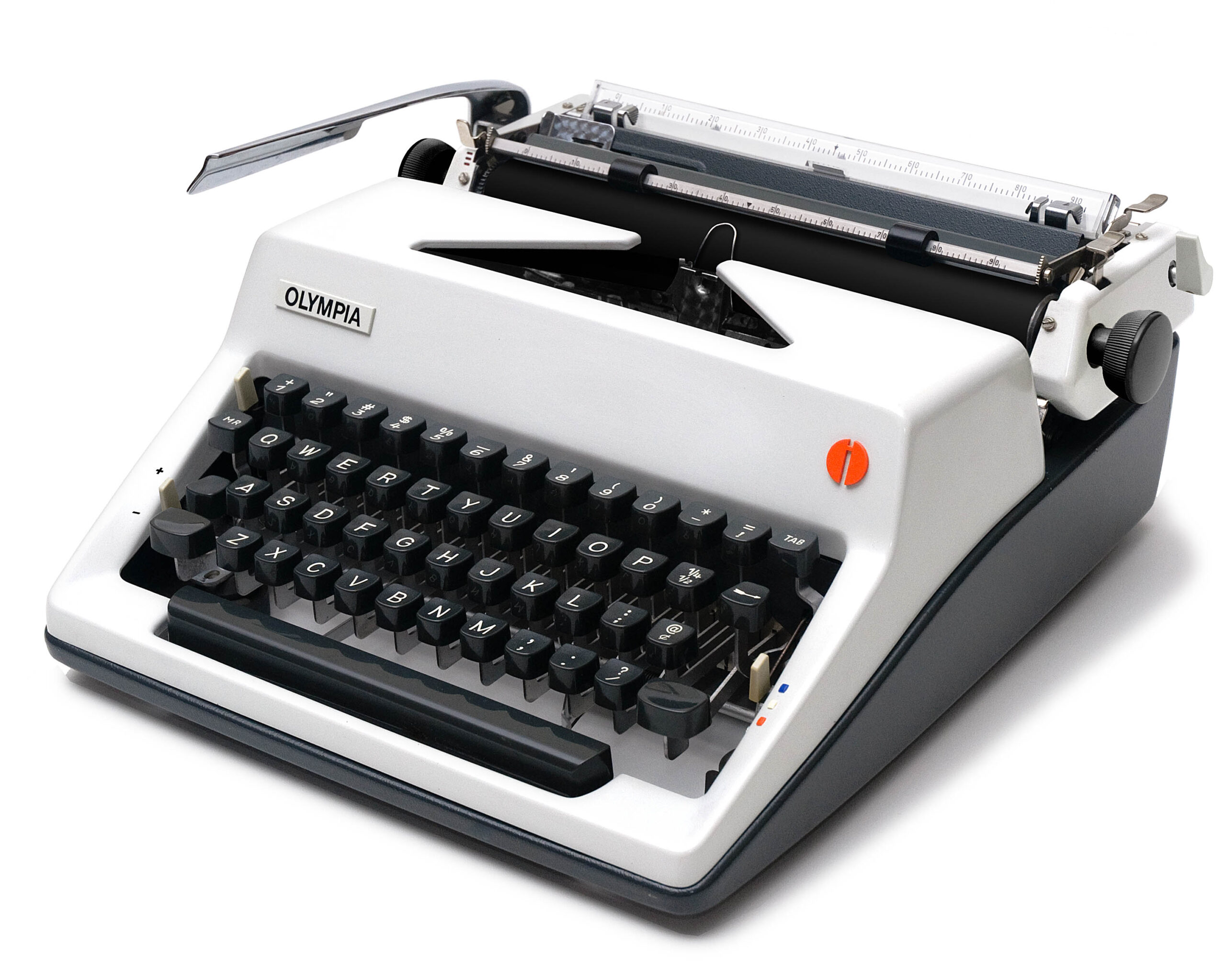Olympia typewriter with a white body, black keys, and a visible carriage, photographed from a low angle.