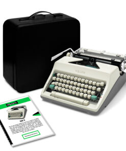 Open-top vintage Olympia typewriter with a black hard case in the background and instruction booklets nearby on a white surface