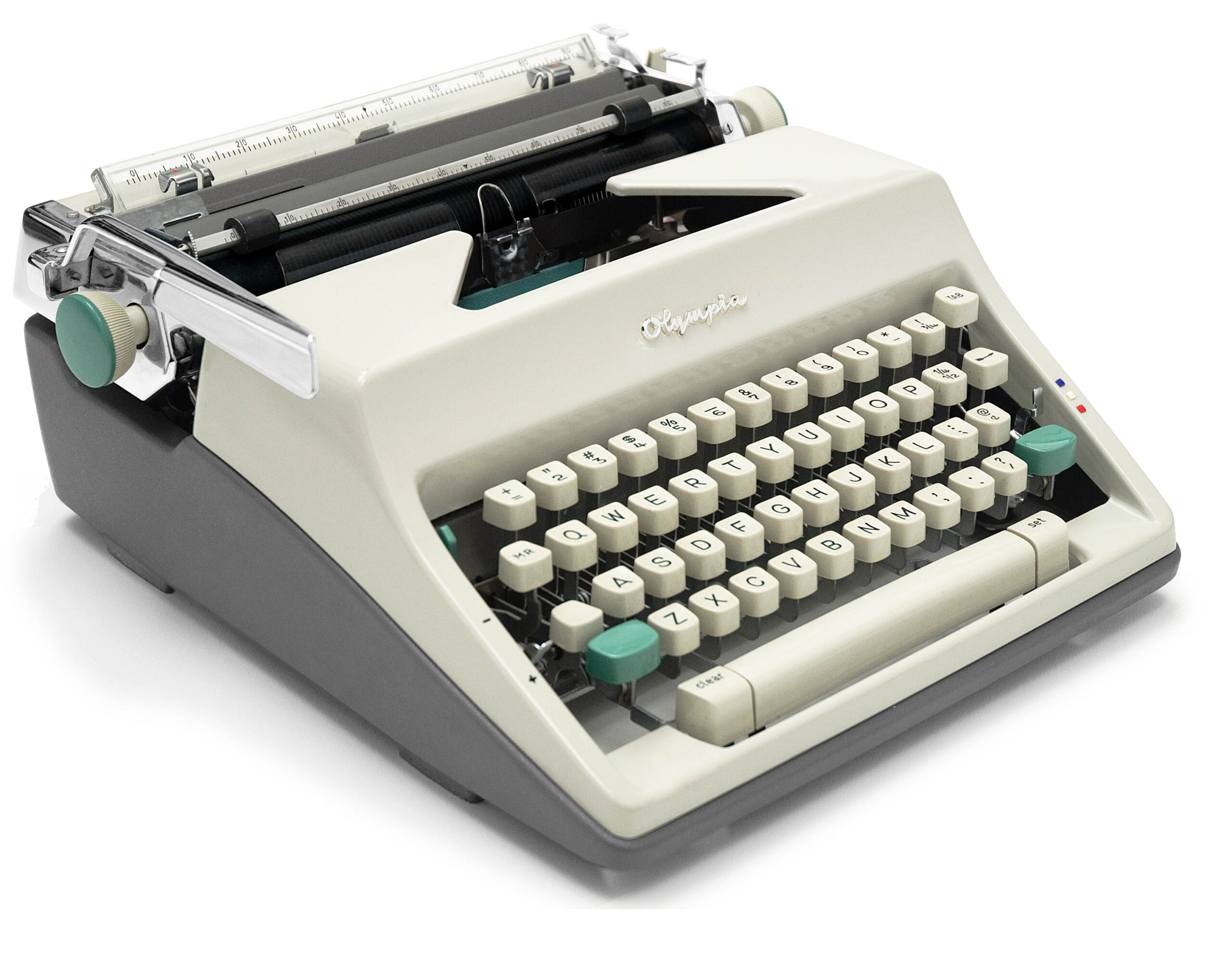 Vintage Olympia-typewriter with a cream body and beige round keys on a white background.
