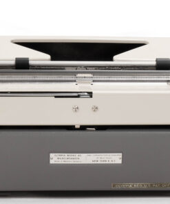 Vintage manual typewriter with gray body, chrome carriage, and green knobs, shown from the front side.