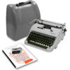 Vintage Olympia typewriter with its hard case and instruction sheets spread nearby.