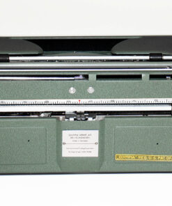 Top-down view of a green vintage manual typewriter showing metal typebars, carriage, and left-side black knob.
