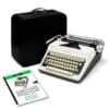 Vintage Olympia typewriter with beige keys beside a black carrying case on a white background.