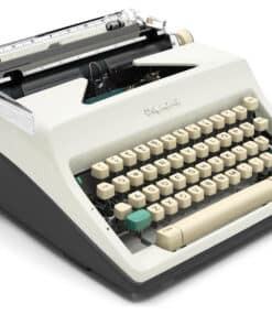Vintage manual typewriter with cream keys and a cream body, angled view showing keyboard and typebars