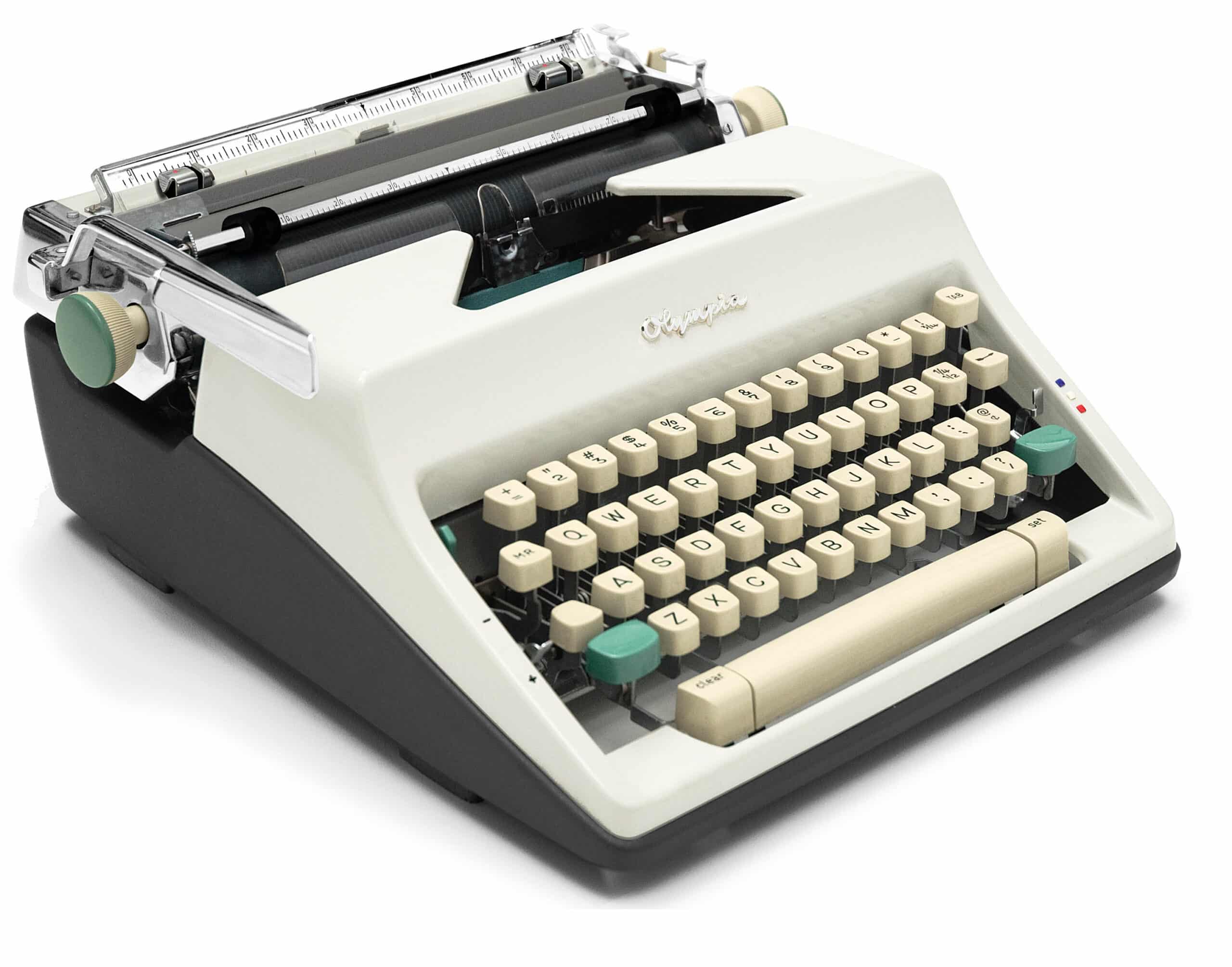 Vintage manual typewriter with cream keys and a cream body, angled view showing keyboard and typebars