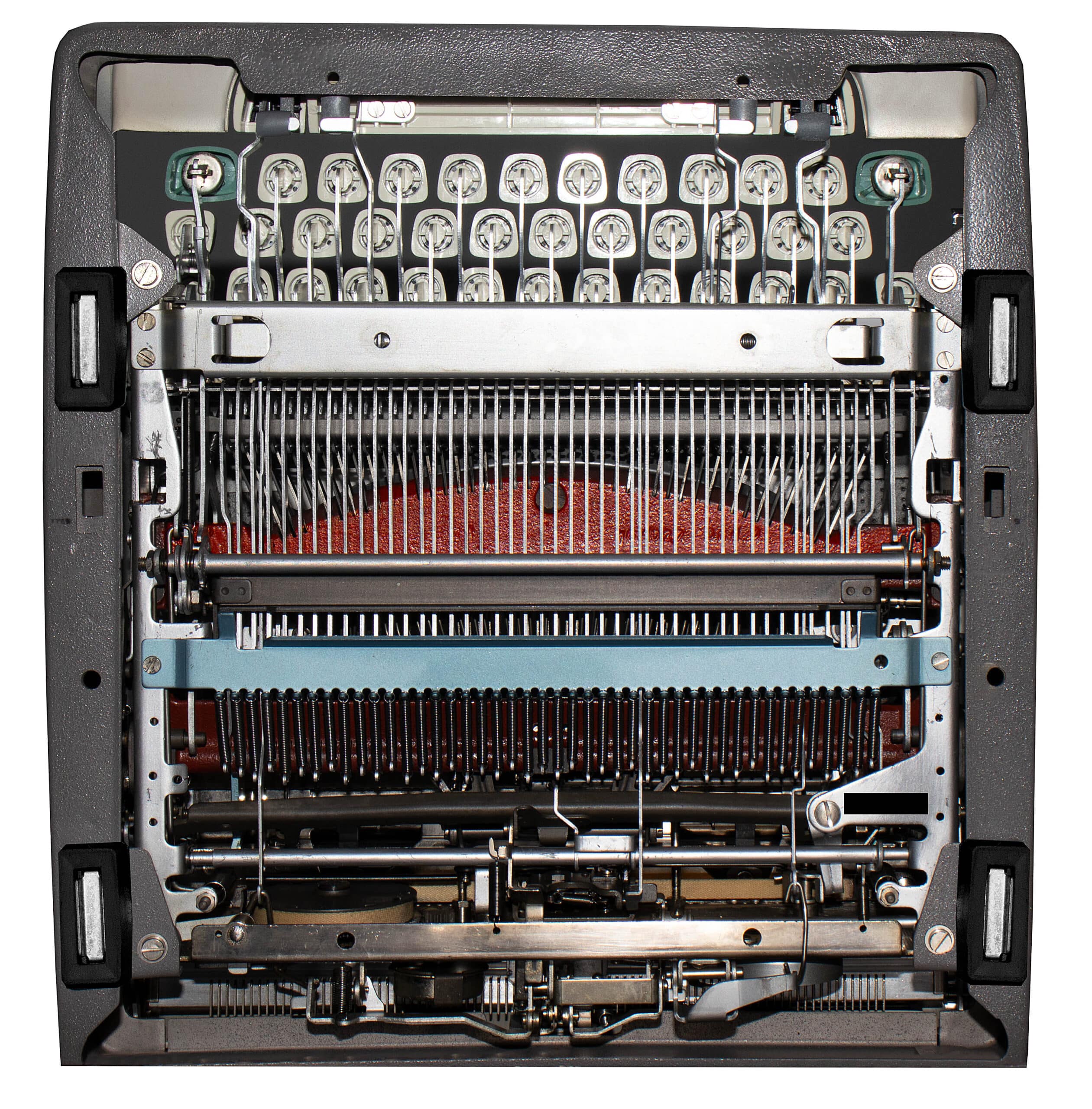 Close-up of a printer's internal print head and ribbon, showing many metal pins and guide rods.