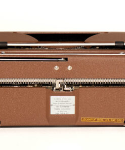 Brown vintage Olympia typewriter viewed from the front-left, showing keys and typebars beneath a textured casing.