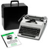 Vintage Olympia manual typewriter with open case and instruction sheets laid nearby.