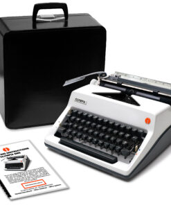 Vintage Olympia typewriter with a black carrying case and nearby operating manuals.