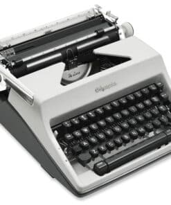 Close-up of a vintage gray typewriter showing black keyboard keys and metal carriage.