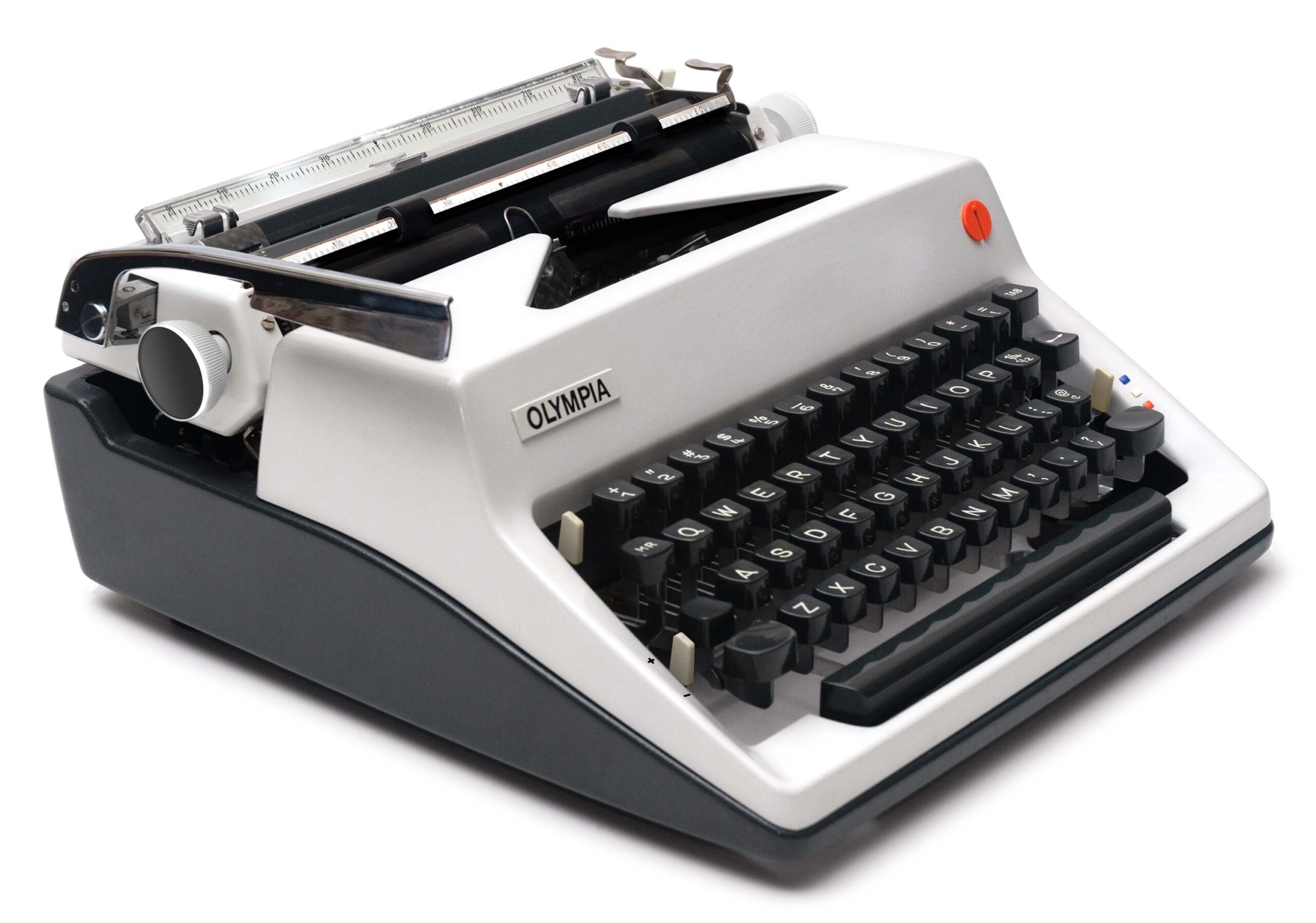 Vintage Olympia typewriter viewed from front-left, showing white body, black keys, and red reset button.