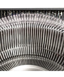 Close-up of a curved row of metal type slugs with letters, part of a vintage printer or typewriter mechanism