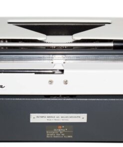Old Olympia typewriter with white body and dark base, showing the typing mechanism and brand label 'Olympia' on the front.