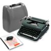 Vintage Olympia manual typewriter with a gray carrying case nearby and instruction sheets beside it.