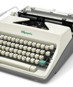 Vintage cream-colored Olivetti typewriter, angled view showing keyboard and mechanism.