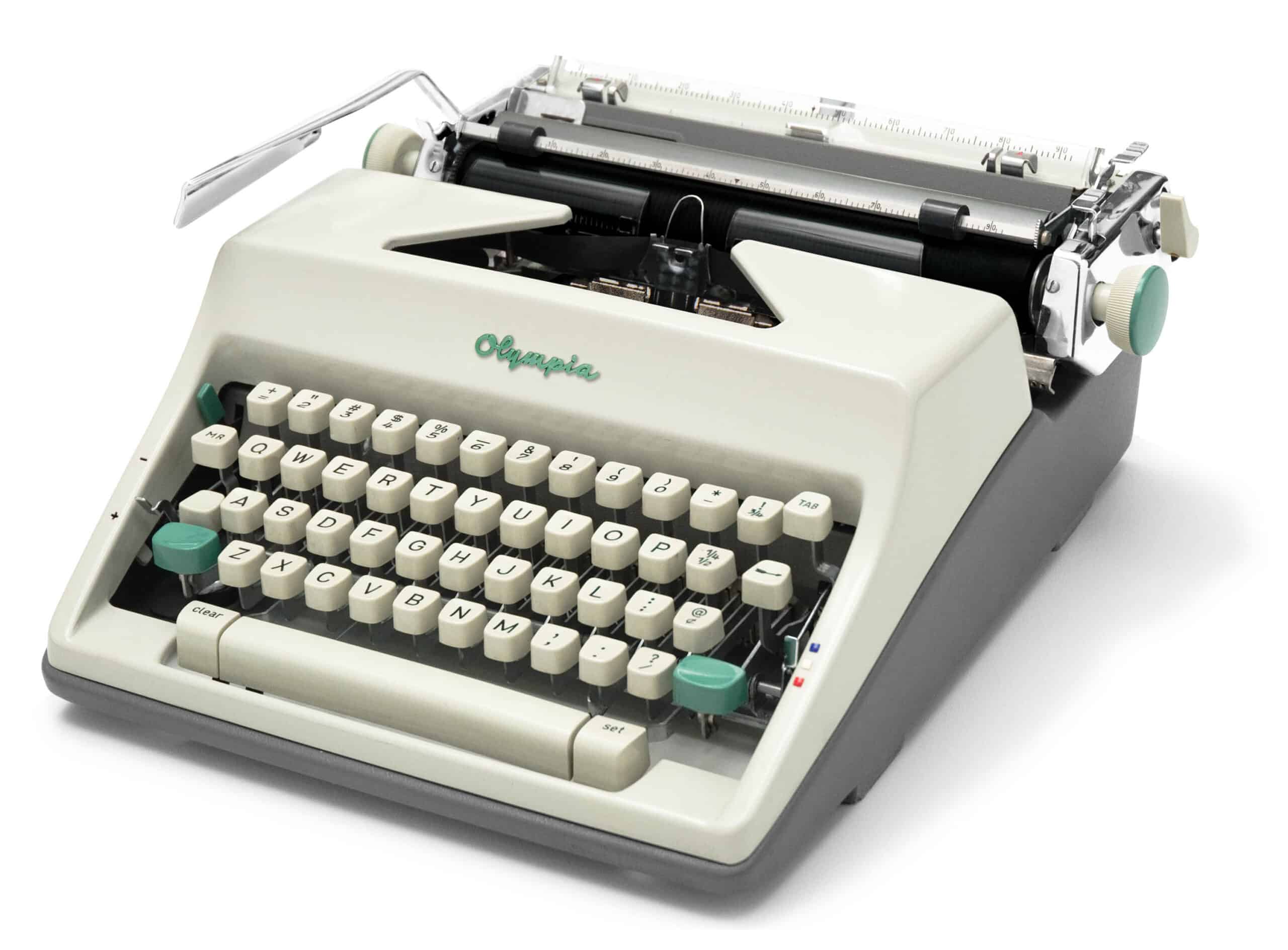 Vintage cream-colored Olivetti typewriter, angled view showing keyboard and mechanism.