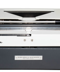 White vintage Olympia typewriter, showing the typing mechanism and brand badge.