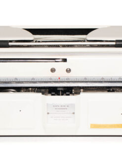 Top-down view of a white vintage Olympia manual typewriter with metal typebars and green adjustment knobs on the sides.